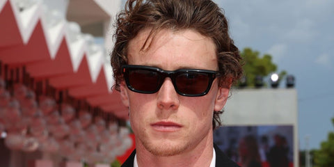 Actor George MacKay was seen wearing black Gucci GG1524S 001 sunglasses at the Venice Film Festival 2025. Shop online now on Pretavoir