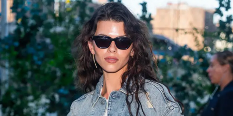 Georgia Fowler was seen wearing black Saint Laurent Sun SL 462 Sulpice 001 sunglasses to attend the Tommy Hilfiger Spring/Summer 2025 fashion show during New York Fashion Week