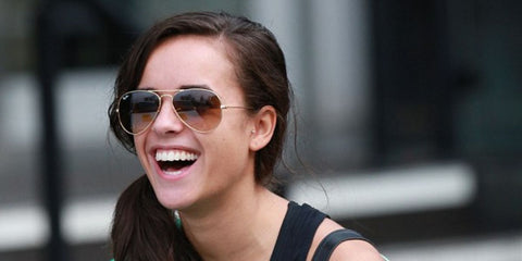 English actress Georgia May Foote was seen wearing Ray-Ban Aviator RB 3025 9001/A5 sunglasses with brown pink gradient lenses