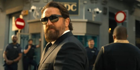 Gerard Butler is seen wearing Oakley Holbrook OO9102 D6 Prizm Polarised sunglasses in the 2025 movie "Den of Thieves 2: Pantera"