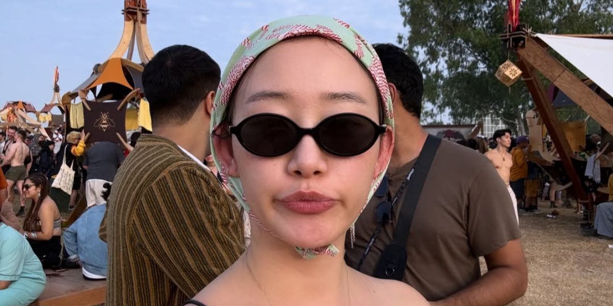 South Korean actress Gia Kim was seen wearing black Miu Miu MU 04ZS 1AB5S0 sunglasses in her Instagram post, December 2025.