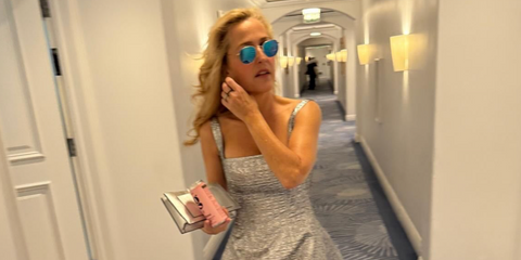 Gillian Anderson was seen wearing Ray-Ban RB 3548N 001/9O Hexagonal Gold with Flat light blue mirror lenses to the 2024 Emmy Awards