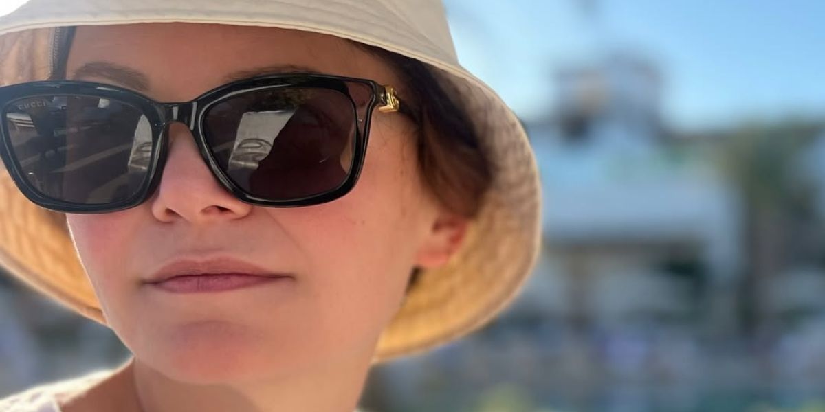 Ginnifer Goodwin is seen wearing Gucci GG1596SK 001 black sunglasses in her husband Josh Dallas' Instagram post