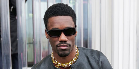 Giveon was seen wearing tortoiseshell Prada PR 06YS 2AU8C1 rectangular sunglasses to attend the Prada Menswear Fall/Winter 2023 fashion show during Milan Men's Fashion Week