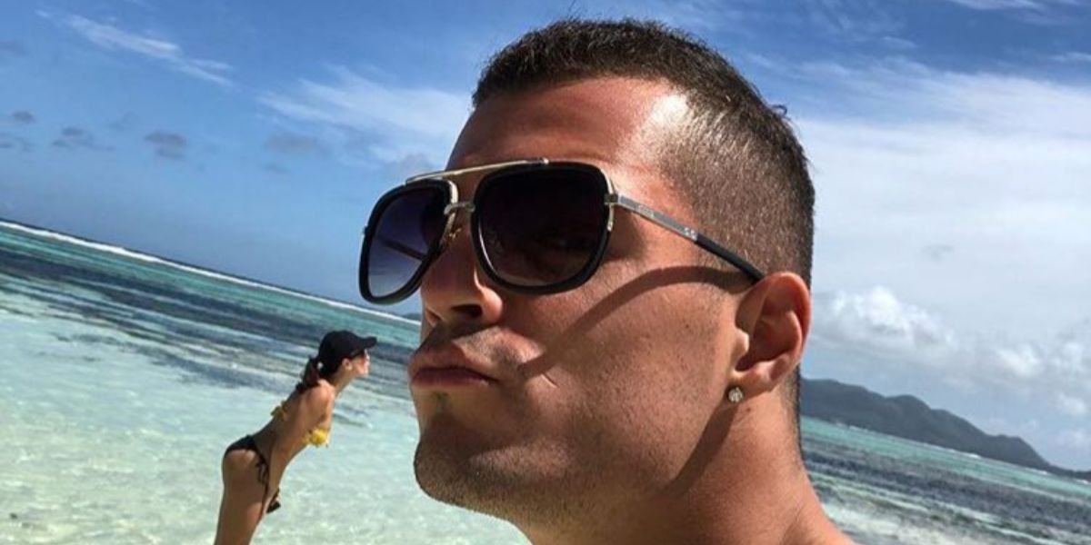 Swiss footballer Granit Xhaka was seen wearing silver Dita Mach One DRX 2030 E sunglasses with grey gradient lenses in a social media post.