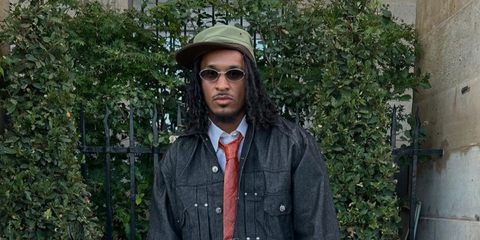 American football player Grant Delpit was seen wearing silver Bottega Veneta Sardine BV1386S 003 oval sunglasses with grey gradient lenses in his Instagram post, July 2025.