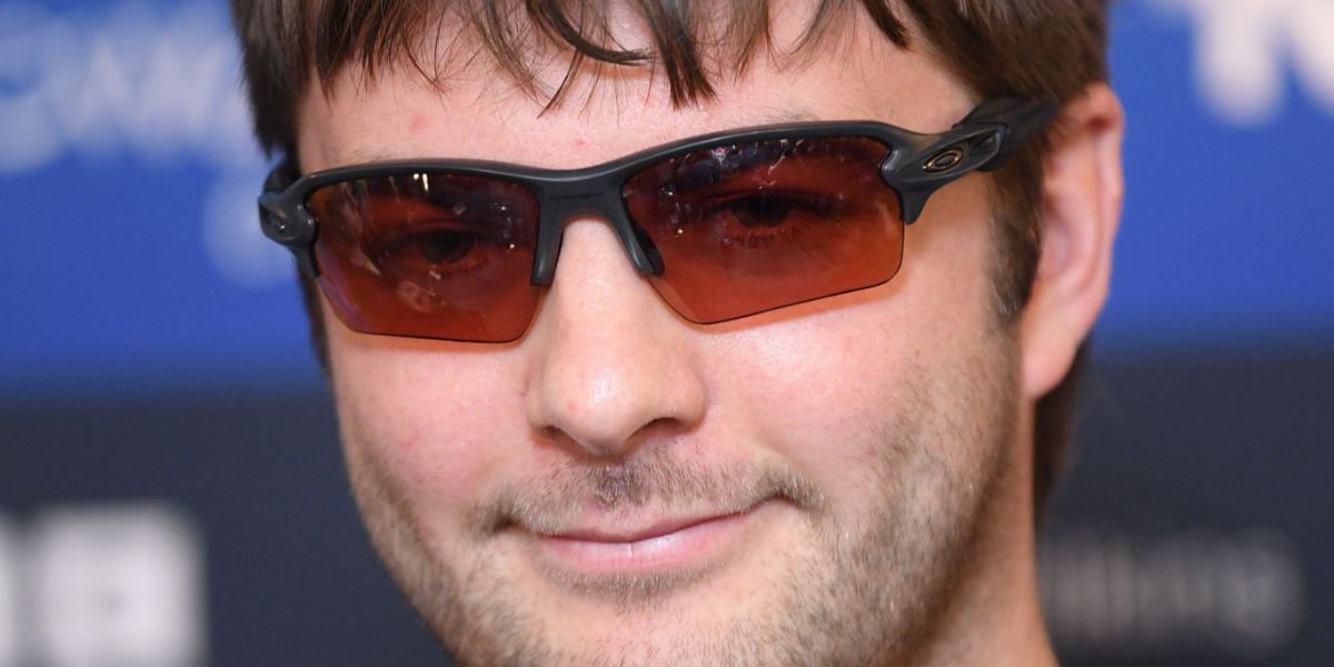 Irish musician Grian Chatten of punk band Fontaine D.C. was seen wearing matte black Oakley Flak 2.0 XXL OO9488 08 Prizm sunglasses at the 