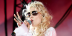 Singer Grimes was seen wearing black and gold Dita Mach-X DTS 463 01 sunglasses onstage during day three of Coachella Music Festival 2026