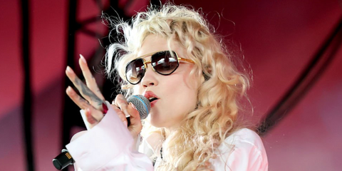 Singer Grimes was seen wearing black and gold Dita Mach-X DTS 463 01 sunglasses onstage during day three of Coachella Music Festival 2026