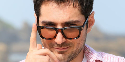 French movie director Guillaume Marbeck was seen wearing tortoiseshell Zegna EZ0270/S 55E sunglasses at the Cannes Film Festival 2025. Shop online now on Pretavoir