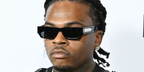 Rapper Gunna at the iHeart Radio Awards 2024 wearing black Saint Laurent Sun SL 660 001 sunglasses - buy online at Pretavoir.