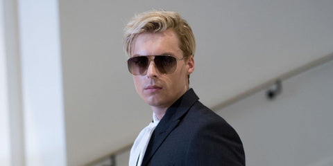Norwegian entrepreneur Gustav Magnar Witzoe was seen wearing gold Gucci GG0336S 001 aviator sunglasses with brown gradient lenses at the Cannes Film Festival 2023.