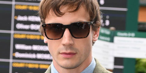 British rising actor Guy Remmers was seen wearing tortoiseshell Polo Ralph Lauren PH4224U 5003/13 sunglasses with brown gradient lenses at the Wimbledon Tennis Championships 2025. Shop online now on Pretavoir