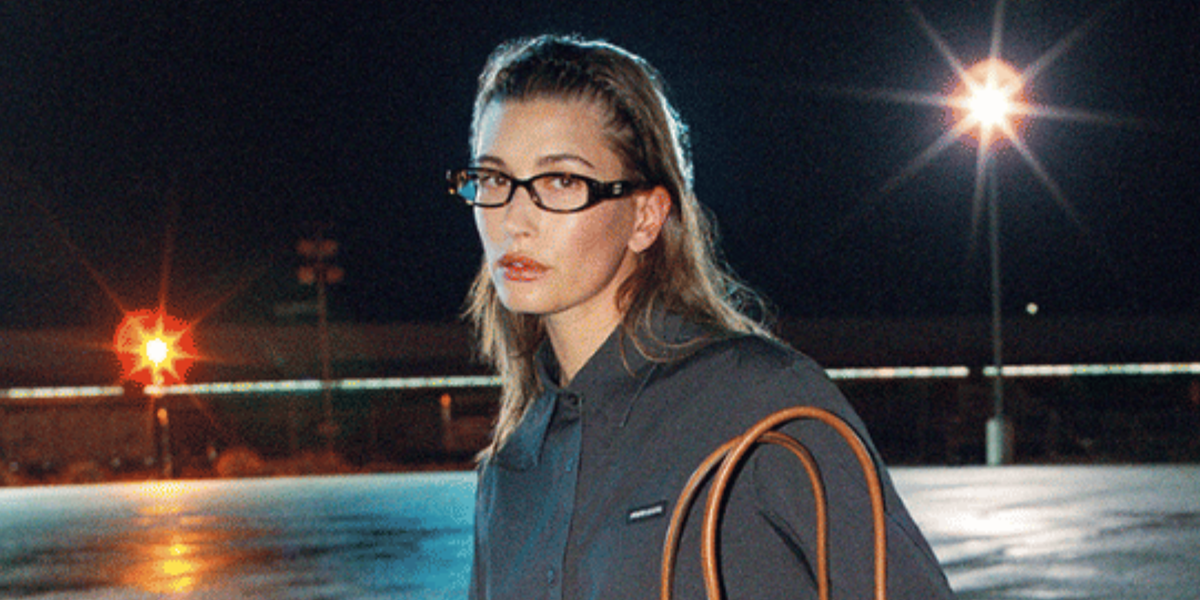 Hailey Bieber wore tortoise Miu Miu MU 06ZV 14L1O1 optical glasses in the Miu Miu Fall Winter 2026 campaign