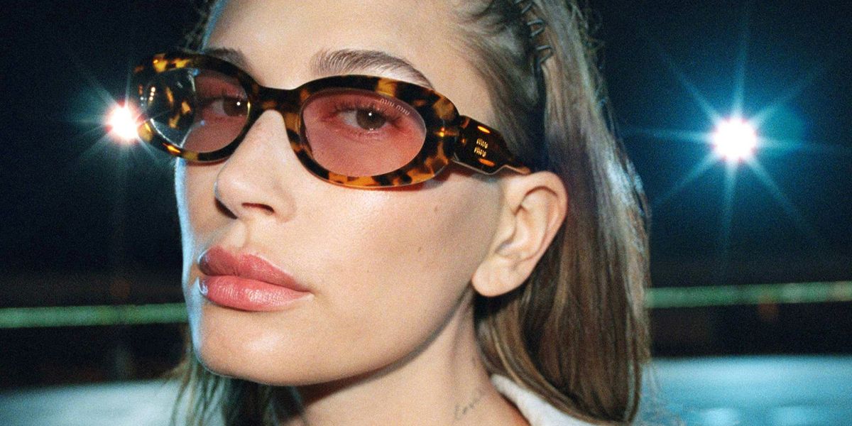 Hailey Bieber wore tortoise Miu Miu MU C01S 14L4I0 Ciel sunglasses in the Miu Miu Fall/Winter 2026 campaign.