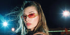 Hailey Bieber wore transparent yellow Miu Miu MU C07SU 24S81E sunglasses with pink gradient lenses in the Miu Miu Fall Winter 2026 campaign.