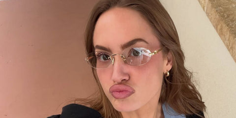 Haley Kalil was seen wearing gold Miu Miu MU 53WV 5AK1O1 rimless oval optical glasses in her Instagram post, August 2026.