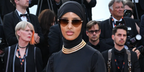 Halima Aden was seen weariing gold Cartier Panthere CT0399S 002 rimless sunglasses with brown gradient lenses at the 2023 Cannes Film Festival