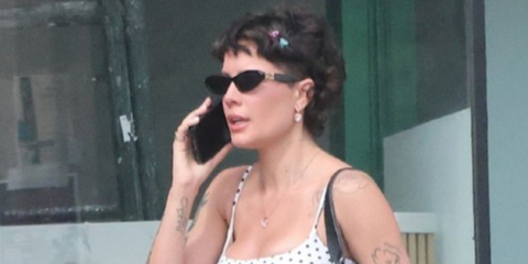 Halsey was seen wearing black Miu Miu MU A04S 16K08Z cat eye sunglasses in Los Angeles, July 2026.