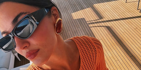 Turkish actress Hande Ercel was seen wearing black Saint Laurent SL M140 001 sunglasses in her Instagram post