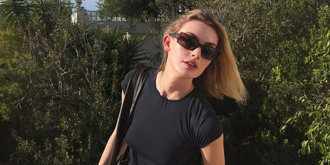Belgian-Dutch model Hanna Verhees was seen wearing transparent brown Ray-Ban Kiliane RB 4395 6678/T3 sunglasses with brown Polarised lenses in her Instagram post