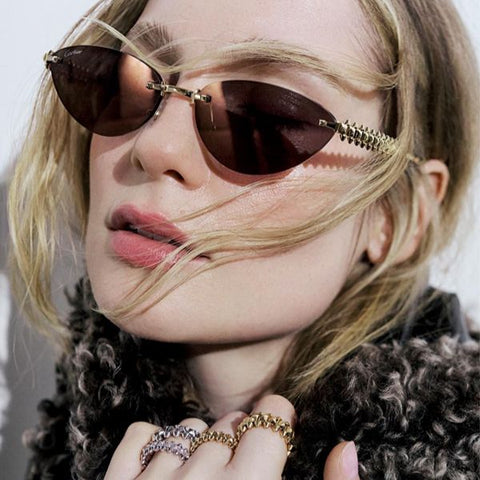 Actress Hannah Dodd was seen wearing gold Clash de Cartier CT0543S 004 rimless cat-eye sunglasses with ivolet bronze lenses in an Exit Magazine feature, Spring/Summer 2026 issue