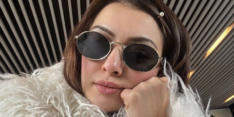 Bollywood actress Hansika Motwani was seen wearing gold Prada PR 65ZS ZVN09T round oval sunglasses with dark grey lenses during her visit to Japan, shared on Instagram. Shop online now on Pretavoir