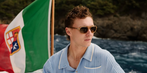 Actor Harrison Osterfield was seen wearing beige Persol Guido 3393S 1169/M2 sunglasses at a Persol event in Liguria, Italy, June 2026.