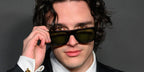 Celebrity actor Harry Collett was seen wearing havana tortoise Prada PR B12S 17N20G Polarised sunglasses with green lenses at the HBO Max UK & Ireland launch event in London, March 2026.
