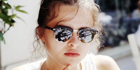 Young Helena Bonham Carter was seen wearing vintage Ray-Ban Clubmaster 3016 Black sunglasses in the 90s