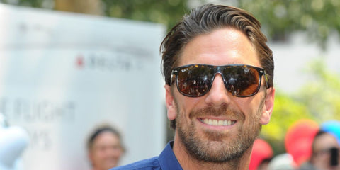 Swedish former professional ice hockey player Henrik Lundqvist was seen wearing tortoiseshell Ray-Ban Boyfriend RB 4147 710/57 Polarised sunglasses at the Delta Open Table Tennis Tournament in New York City, August 2013.