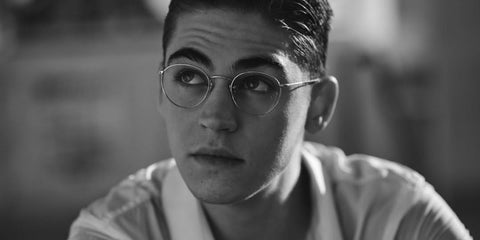 Hero Fiennes Tiffin was seen wearing Oliver Peoples Coleridge OV1186 5036 round optical glasses in the Oliver Peoples campaign