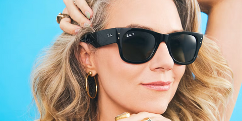 Actress Hilarie Burton was seen wearing black Ray-Ban Mega Wayfarer RB 0840S 901/58 Polarised sunglasses in a ScaryMommy.com feature