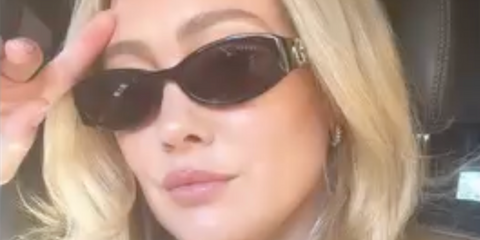 Hilary Duff was seen wearing black Gucci GG1660S 001 oval sunglasses in her Instagram post