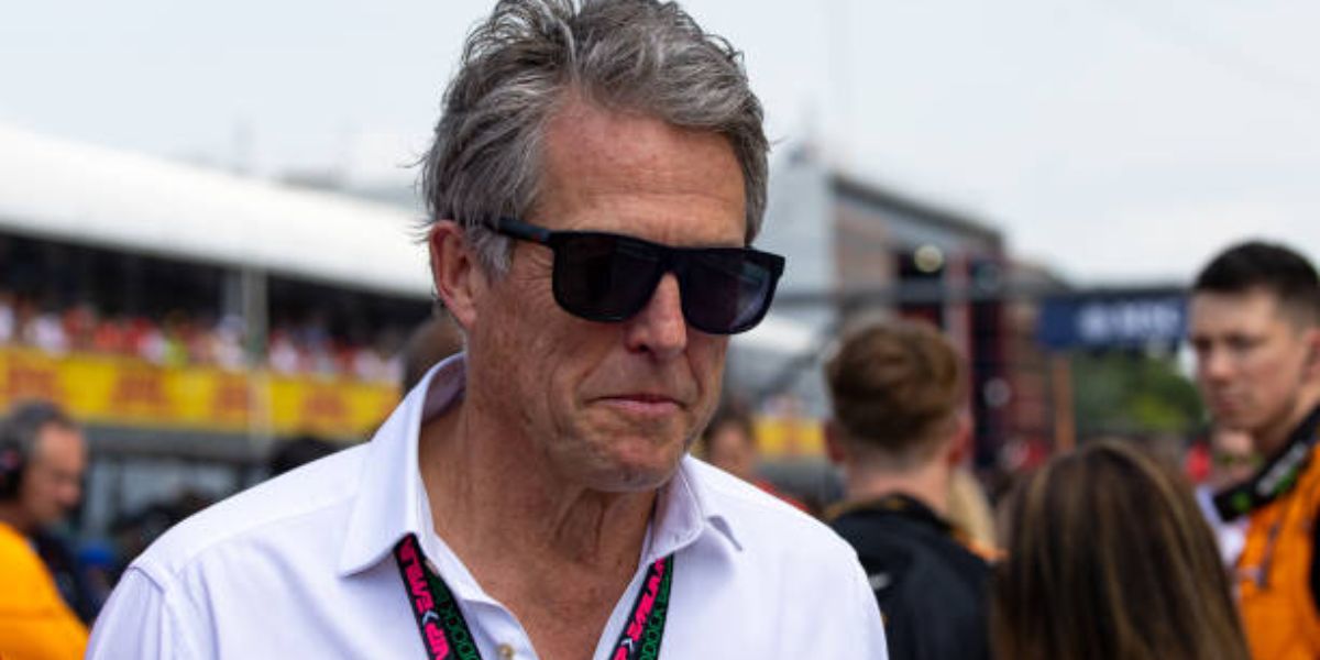 Hugh Grant was seen wearing shiny black and rubber black Gucci GG0010S 001 square sunglasses to attend the 2024 Emilia Romagna Grand Prix in Imola, Italy