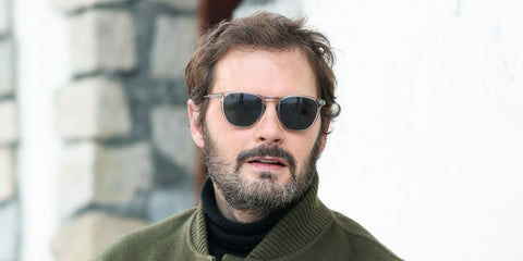 French actor Hugo Becker was seen wearing transparent grey David Beckham DB 1160/S KB7KU sunglasses with blue lenses at the Les Arcs Film Festival 2025.