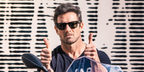 Actor Ian Bohen was seen wearing the iconic black Ray-Ban Wayfarer 2140 901/58 Polarised sunglasses at the 'amfAR Epic Ride to Life Ball' in Zurich, March 2018. Shop online now on Pretavoir