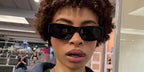 Ice Spice was seen wearing black Saint Laurent SL M140 001 rectangular sunglasses in her Instagram post