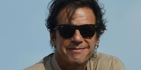 Pakistani cricketer turned politician Imran Khan was seen wearing tortoiseshell Ray-Ban Wayfarer 2140 902/57 sunglasses with brown Polarised lenses during an anti-government protest in Islamabad, September 2014