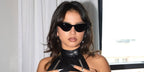 Isabela Merced was seen wearing black Saint Laurent SL M144 001 cat eye sunglasses in her Instagram post