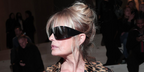 Italian actress Isabella Ferrari was seen wearing black Gucci GG2274S 001 shield sunglasses at the Gucci Fall/Winter 2026 fashion show during Milan Fashion Week.