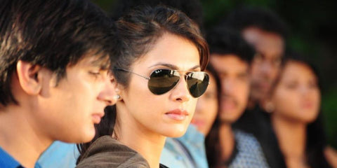 Bollywood actress Isha Koppikar was seen wearing Ray-Ban Aviator 3025 001/58 Gold Frame G15 Polarised sunglasses. Shop online now on Pretavoir