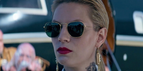 Iva Babic was seen wearing gold Ray-Ban Frank RB 3857 9196/31 square sunglasses in 2023 action-comedy movie The Machine