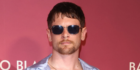 Actor Jack O'Connell was seen wearing silver Ray-Ban RB 3706 003/S2 Polarised sunglasses at the Paris premiere of "Back To Black", April 2024.