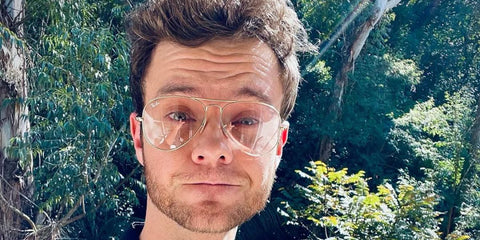 Jack Quaid was seen wearing gold Ray-Ban RB 6489 2500 optical aviator glasses in his Instagram post