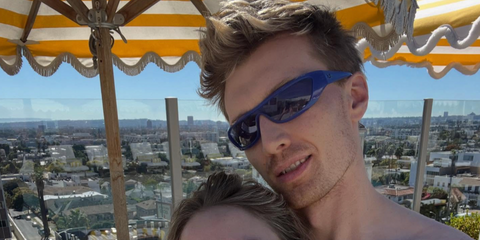 Radio DJ and television host Jack Saunders was seen wearing blue Ray-Ban Xan RB 4431 6761/80 sunglasses with blue lenses in his Instagram post, December 2025.