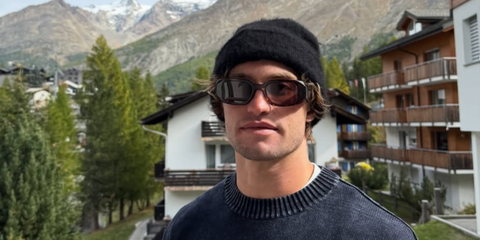 American snowboarder Jake Pates was seen wearing tortoiseshell Prada PR 17WS 2AU8C1 Symbole sunglasses in Switzerland, shared through his Instagram post in December 2025.