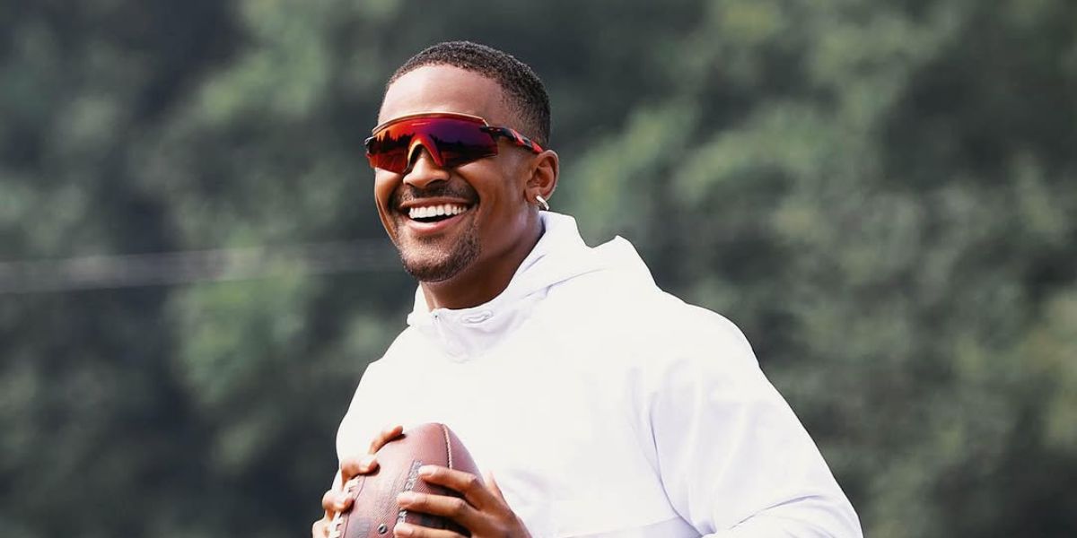 Philadelphia Eagles quarterback Jalen Hurts was seen wearing Oakley Encoder OO9471 01 Prizm sunglasses