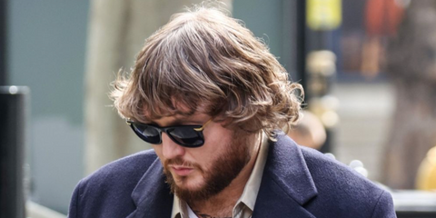 James Arthur was seen wearing black and gold Bottega Veneta BV1369S 001 sunglasses.