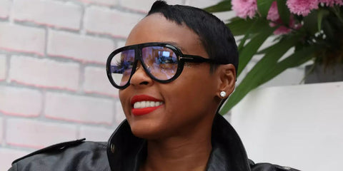 Janelle Monáe wears Tom Ford Troy TF 836 001 Blue Control optical glasses during SXSW Conference & Festivals in Austin, Texas